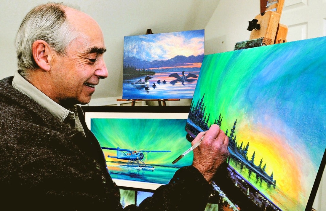 Ken Farrar working on a painting in his studio